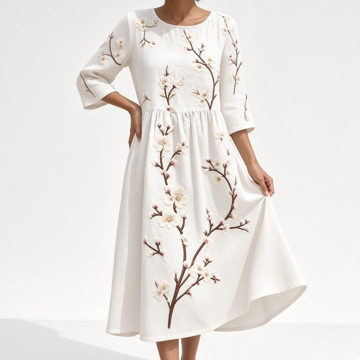 Éloravie™ — Robe fluide brodée pour un charme estival