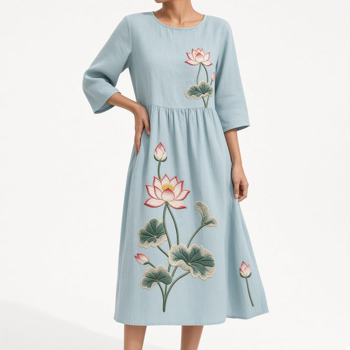 Éloravie™ — Robe fluide brodée pour un charme estival