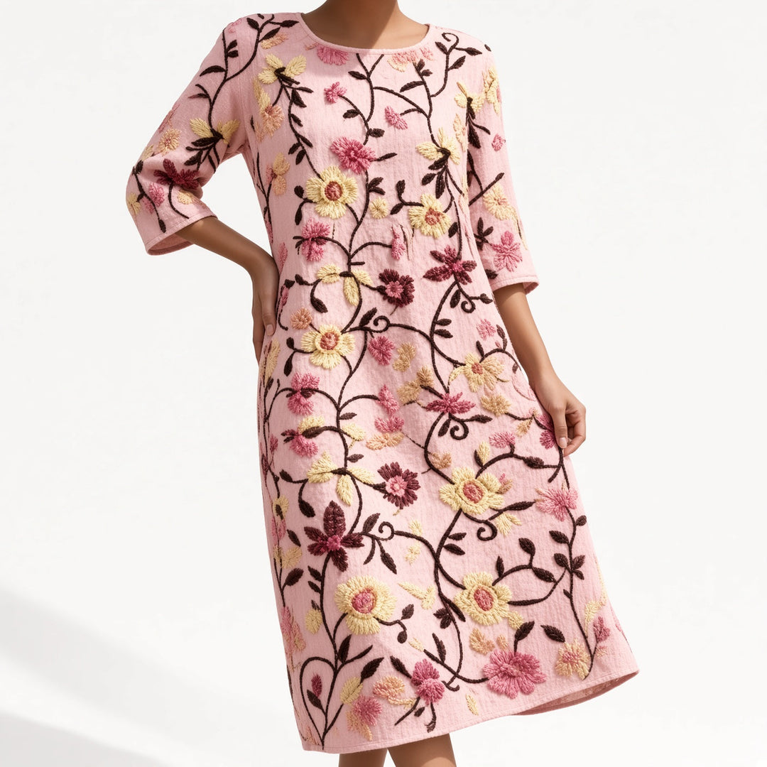 Éloravie™ — Robe fluide brodée pour un charme estival