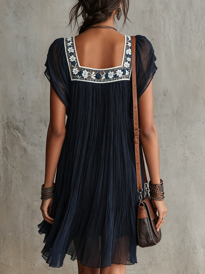 Apolline | Mini Plissé Dress in Embroidered Navy Blue Chiffon
